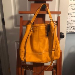 Vibrant mustard hobo Coach bag.  CUTE. NEVER USED